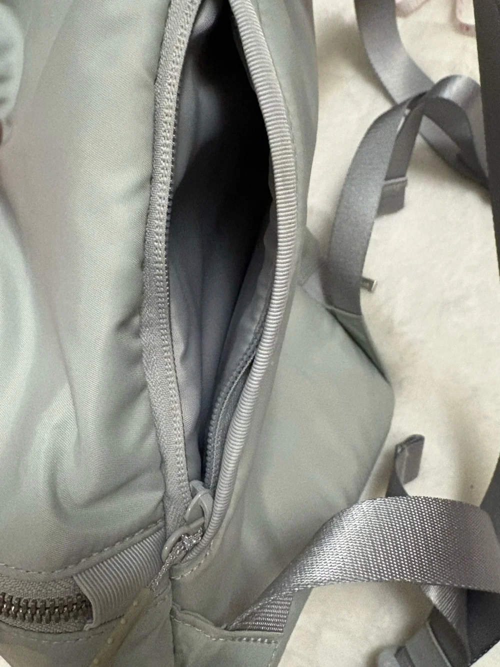 lululemon athletica Light Gray Men’s Backpack with Silver Accents